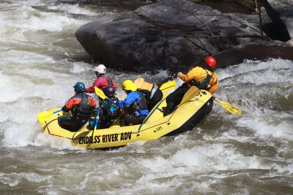Endless River Adventures group of people riding the rapids.