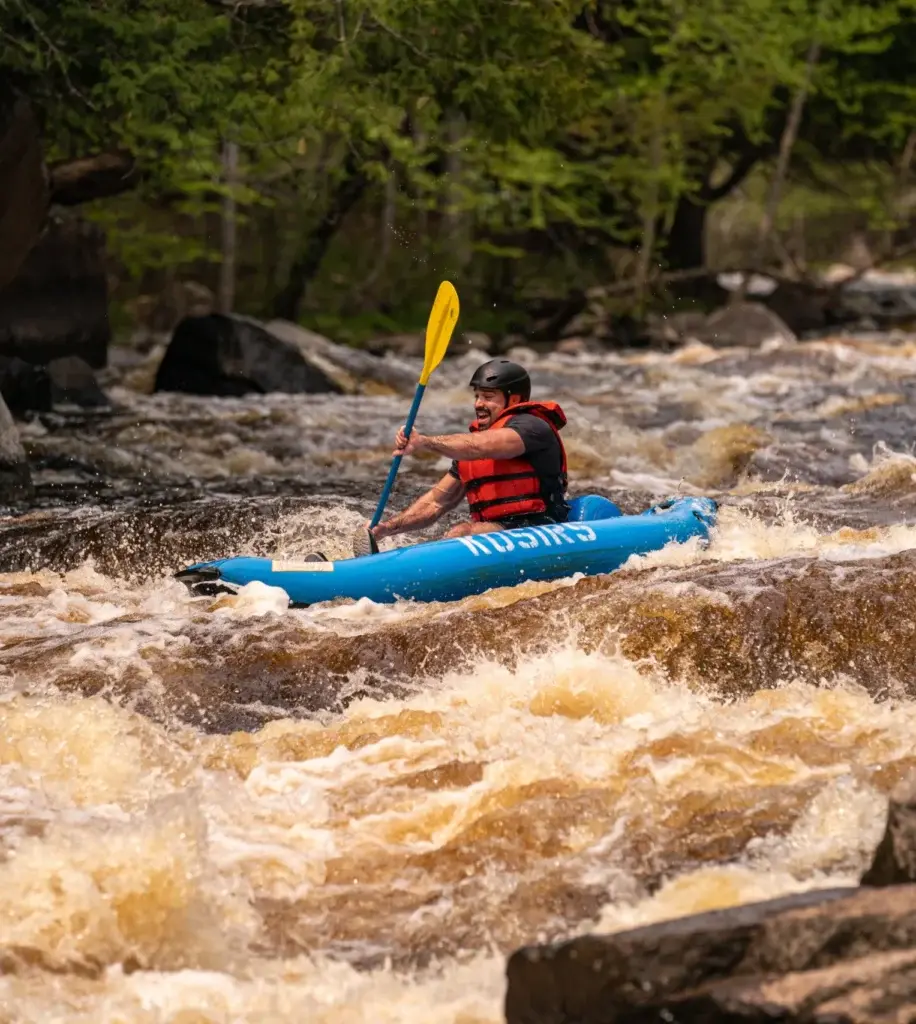Kosir's Rafting in a ducky on the Peshtigo River.