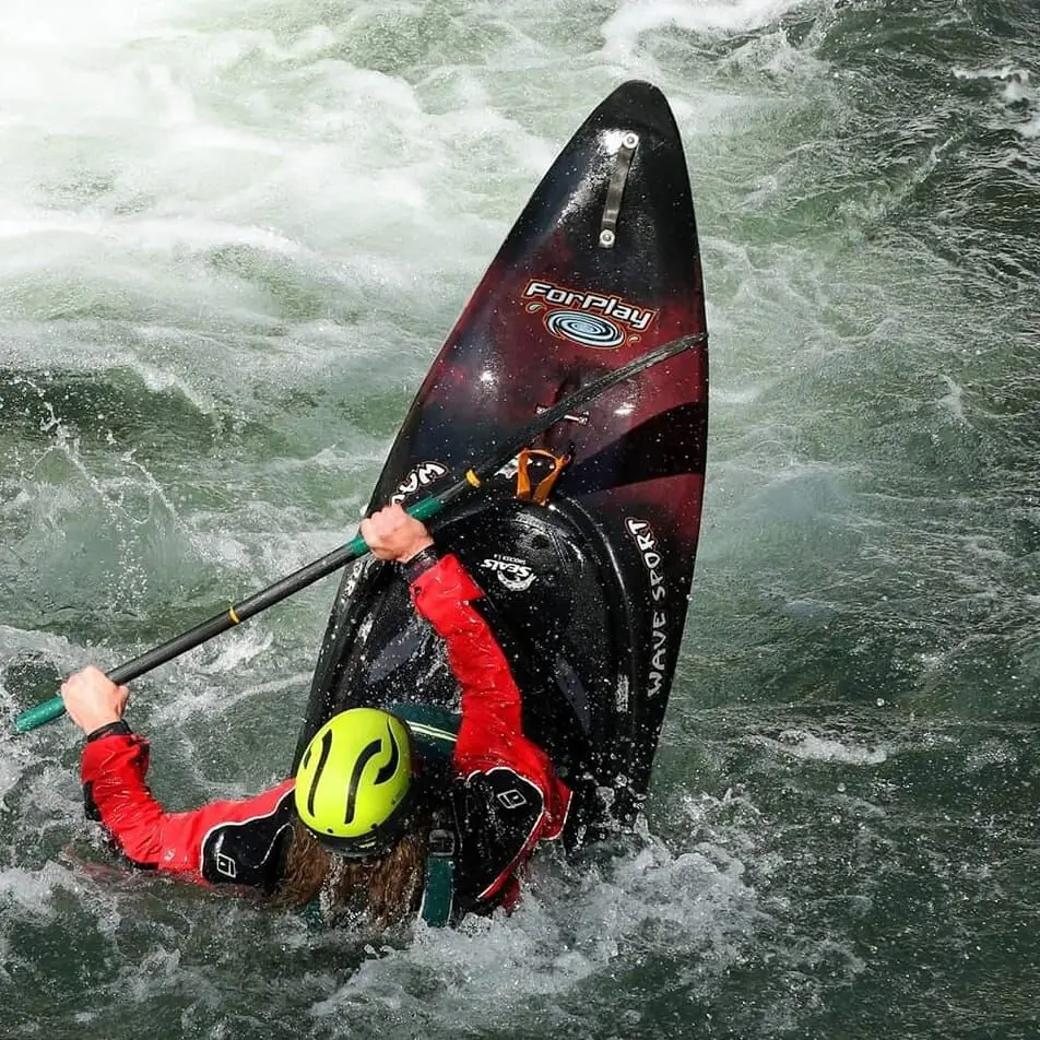 A kayaker "stern squirts' on the Ocoee River.