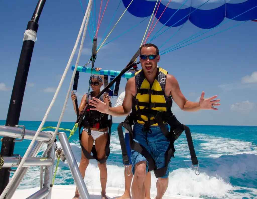 A couple parasailing.